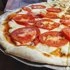 Pizza slices of fresh tomato & oregano